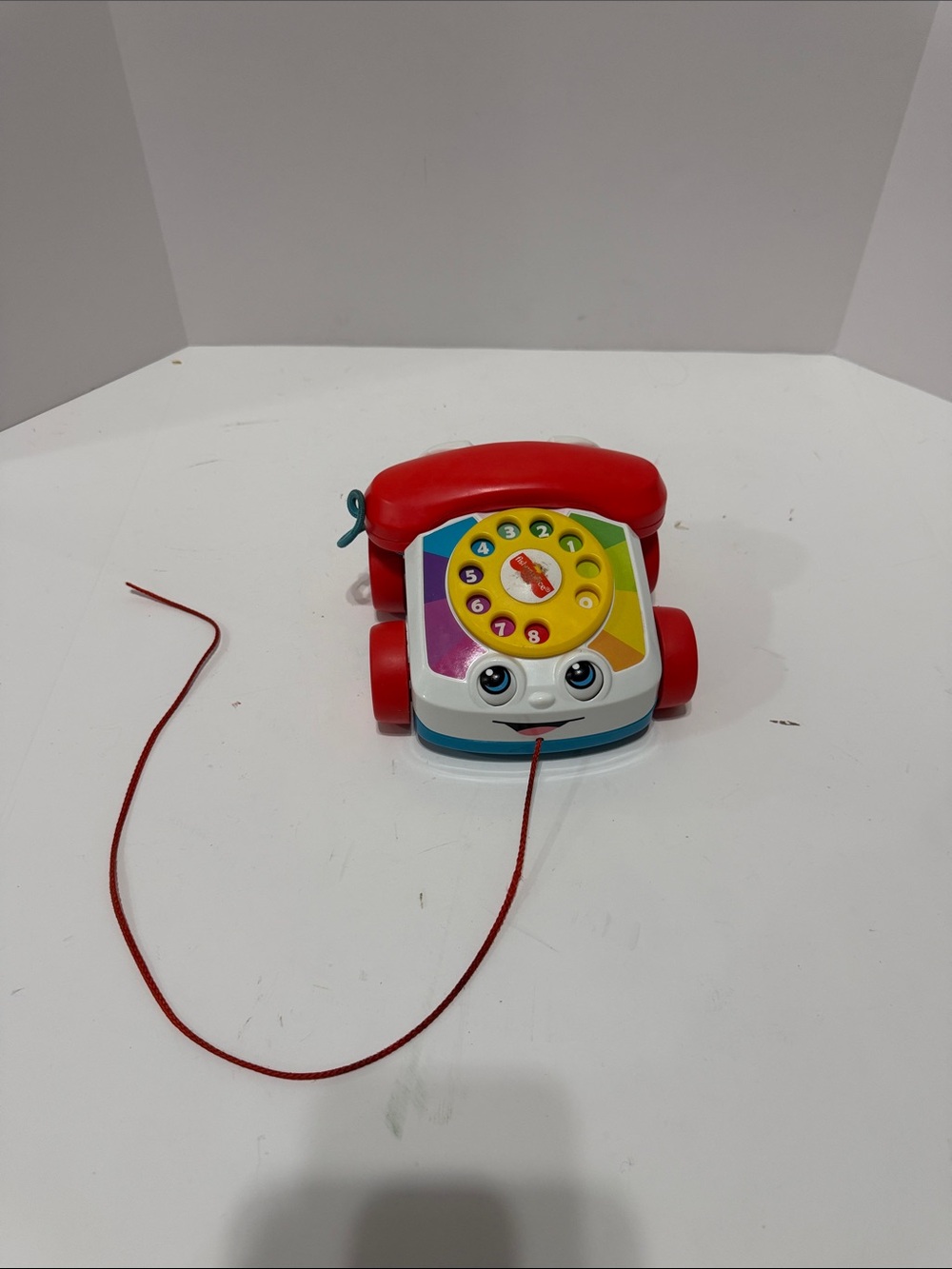 Classic Pull-Along Red Toy Phone with Colorful Dial